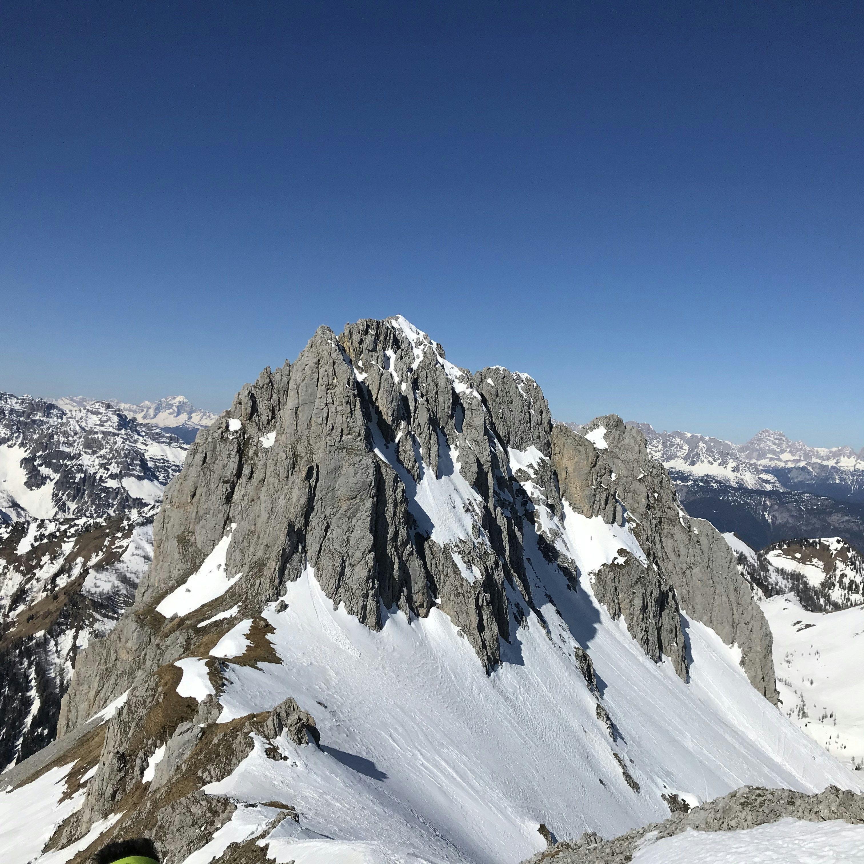 snow covered mountain under blue sky during daytime