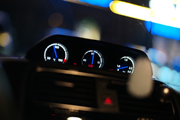 Close-up of a futuristic dashboard with neon teal and electric blue accents, showing real-time analytics.