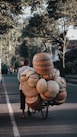 brown wooden round decors on road during daytime