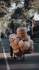 brown wooden round decors on road during daytime