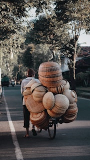 brown wooden round decors on road during daytime