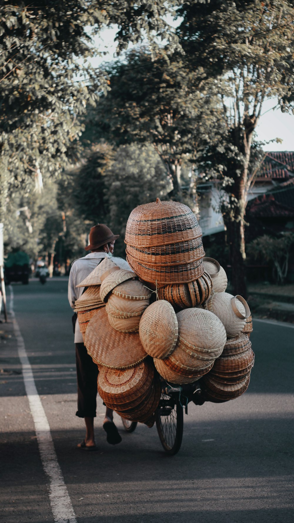 brown wooden round decors on road during daytime
