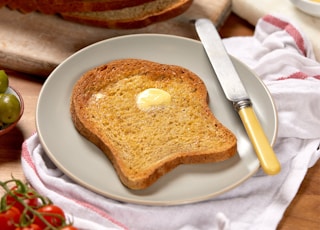 bread on white ceramic plate