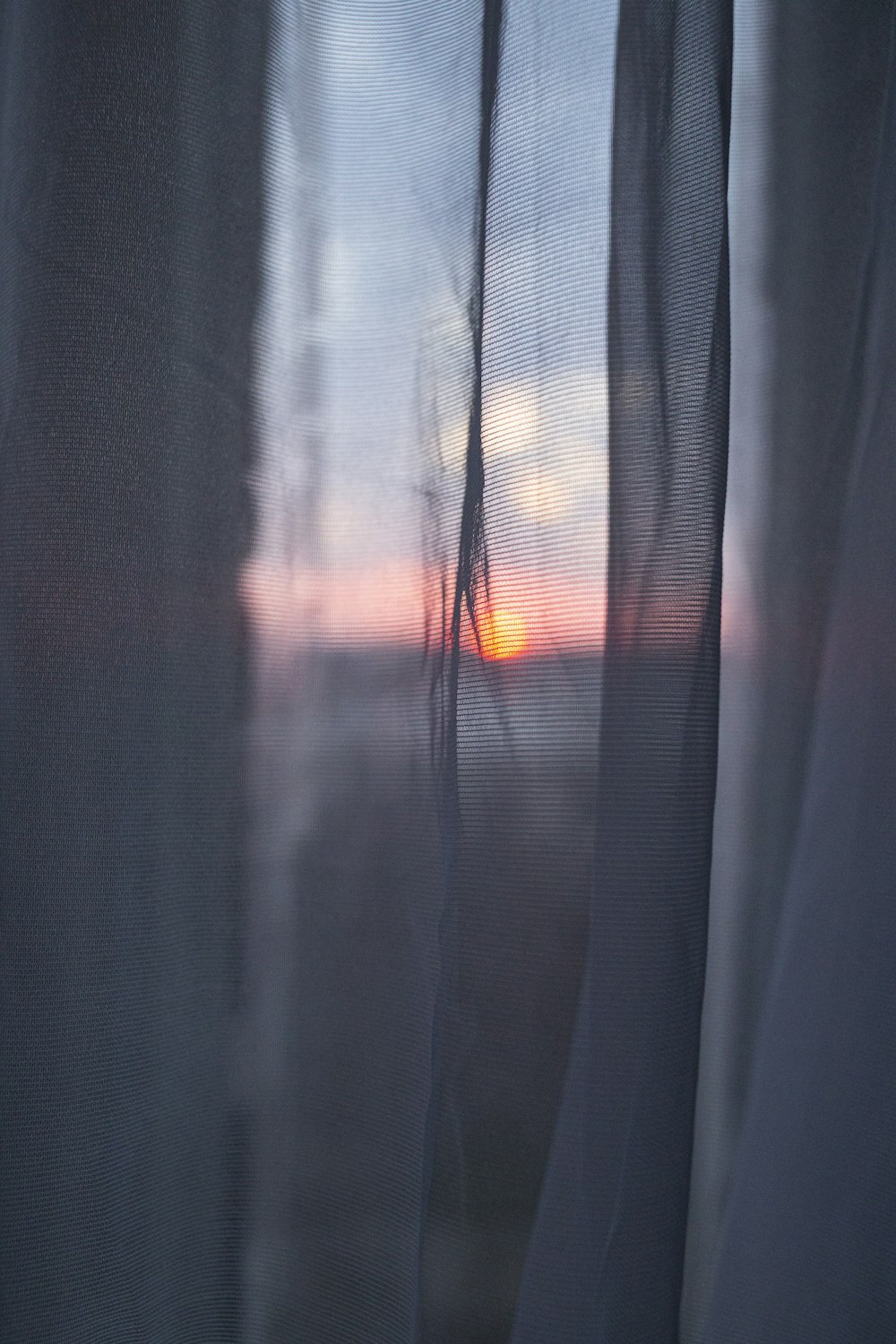 white sheer curtain during daytime