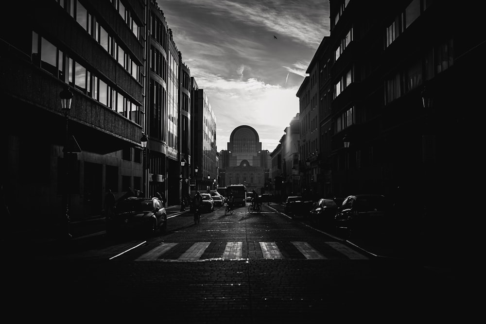 grayscale photo of city buildings