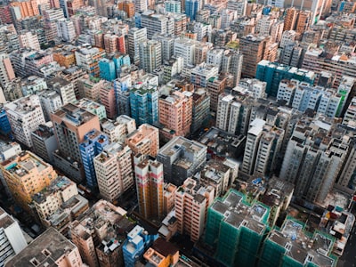aerial view of city buildings during daytime dense zoom background