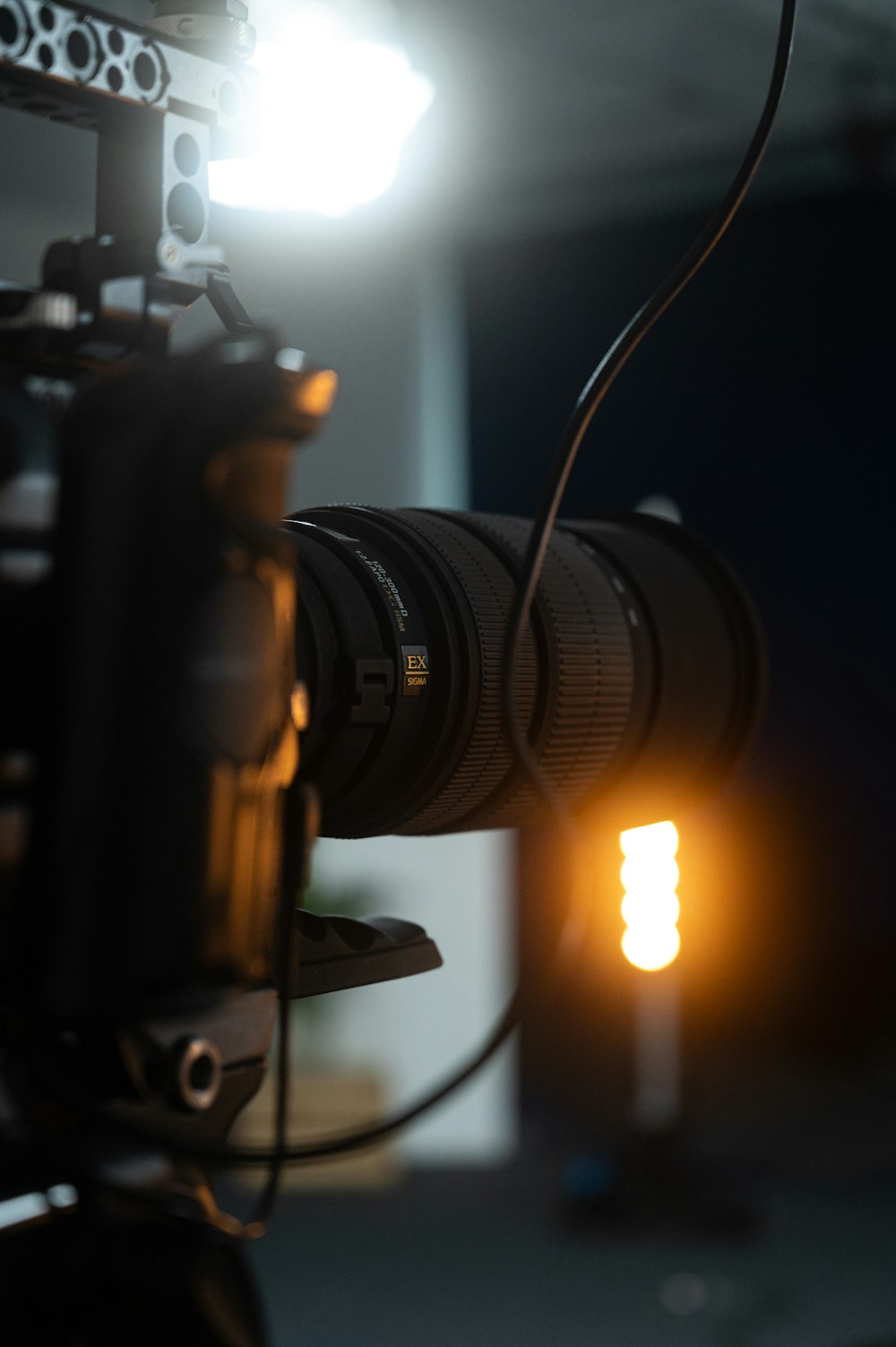 black dslr camera on black table