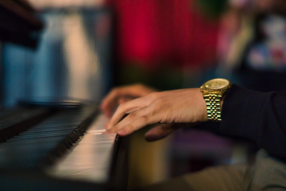 person playing piano in tilt shift lens