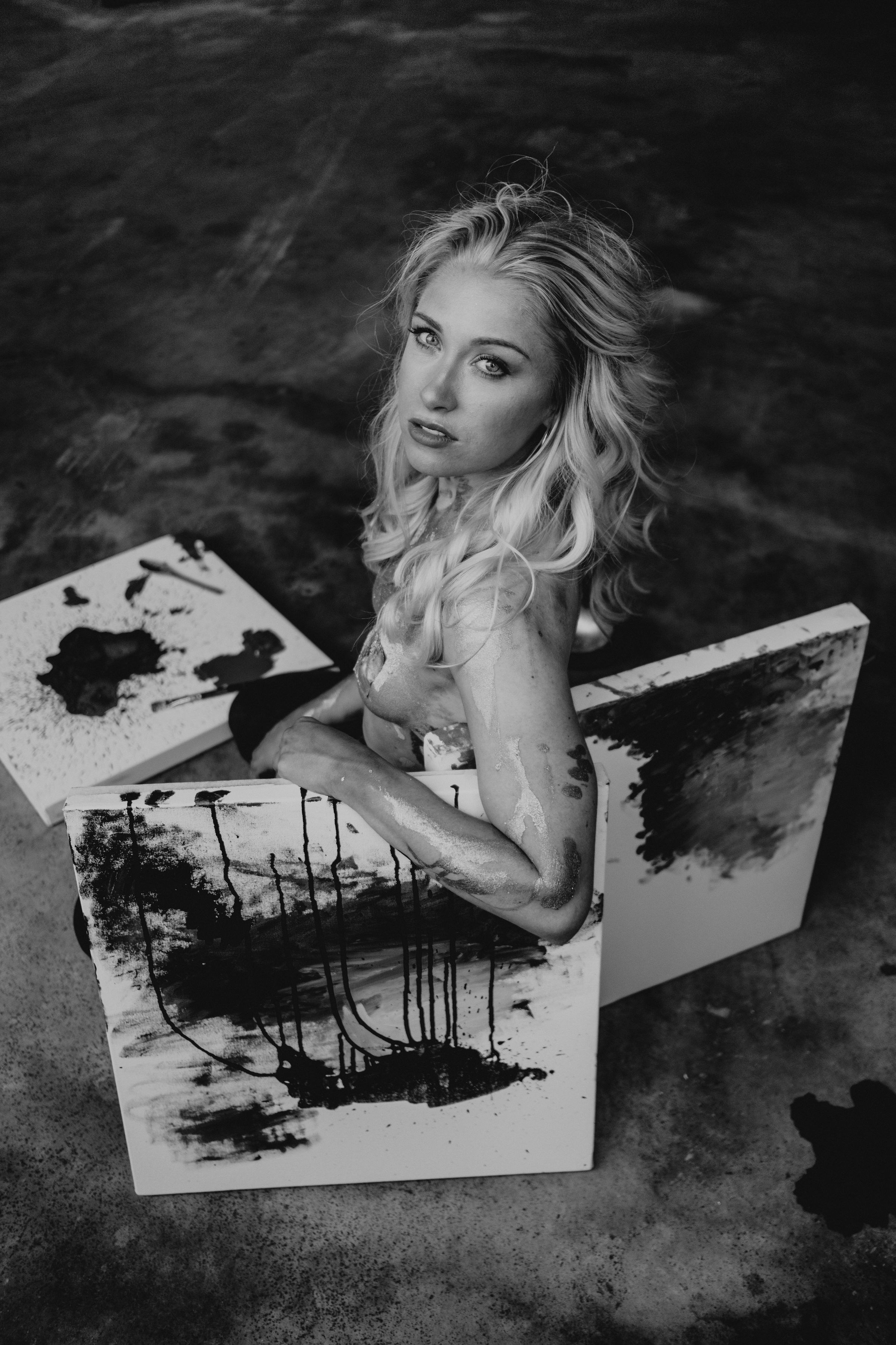 grayscale photo of woman in bikini top