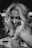 grayscale photo of woman with blonde hair