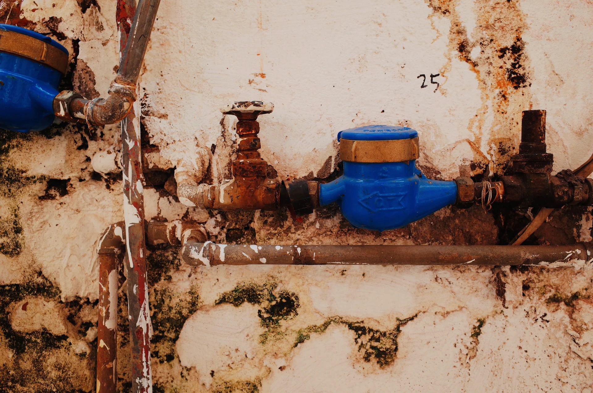 blue propane tank on brown wooden table