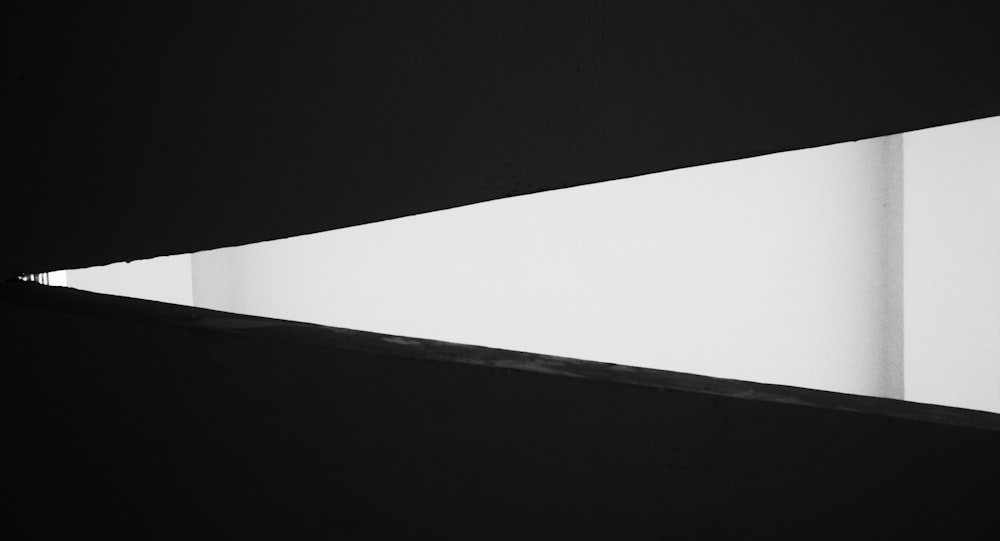 white rectangular frame on black background