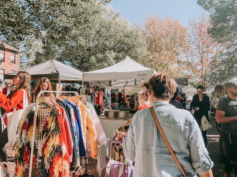 Shoppers at an outdoor pop-up market