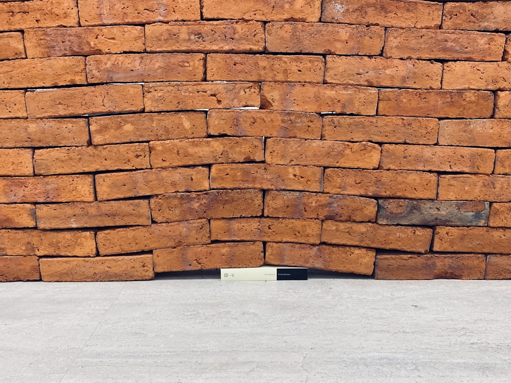 brown brick wall during daytime