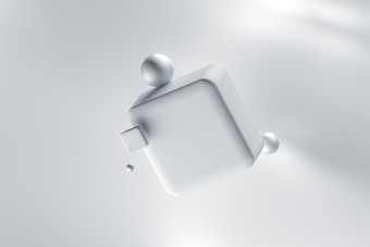 A 3D rendering of a large, smooth, metallic cube floating in a soft, light-colored space. Spherical objects are attached to the cube, creating a minimalist and futuristic appearance.