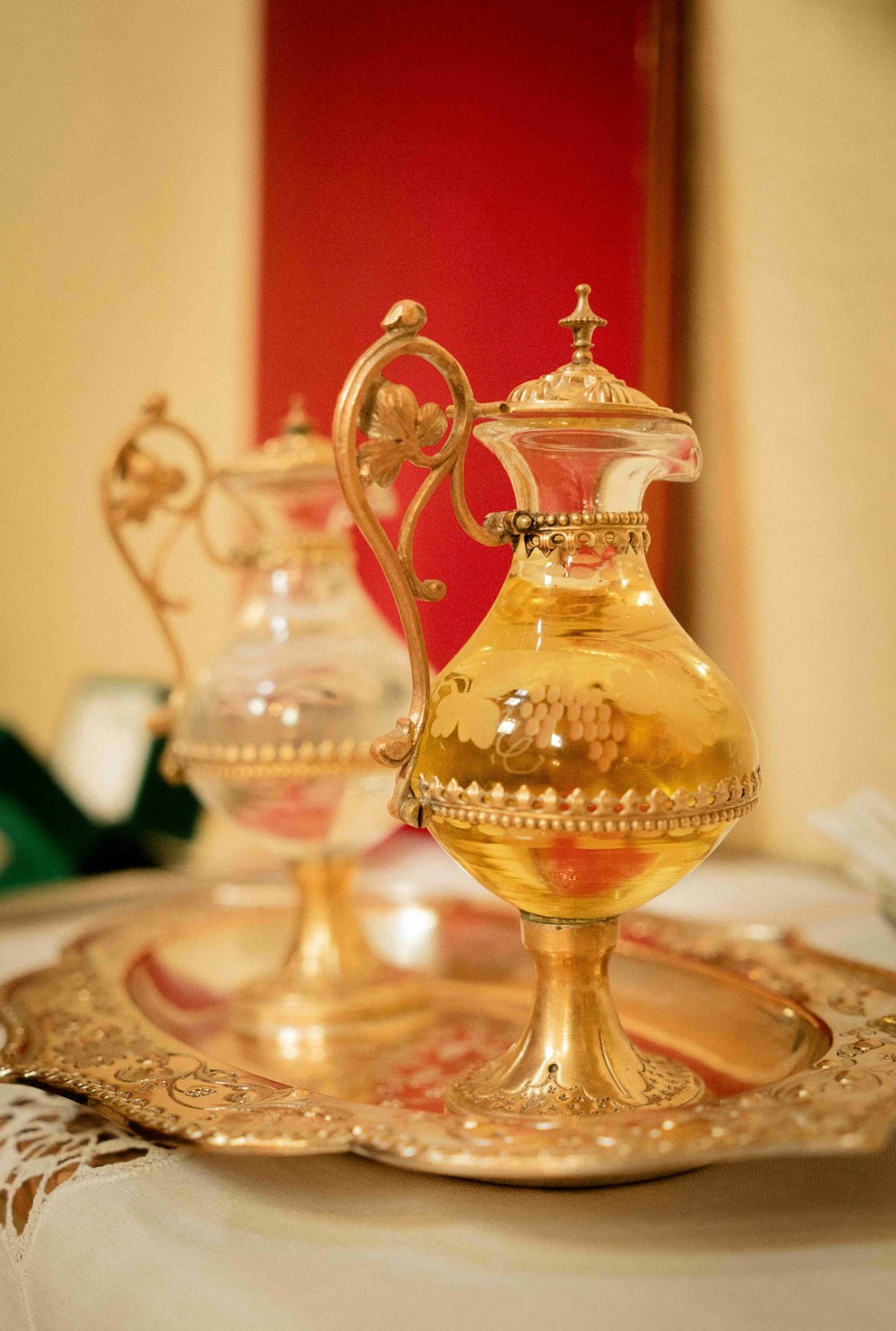 gold and red floral glass vase