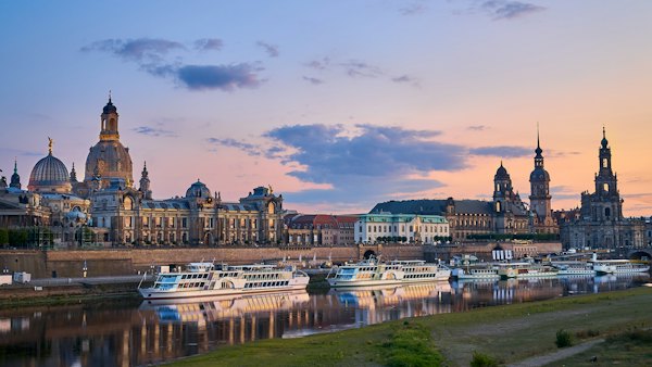 White and brown concrete building near body of water during daytime — Dresden, Germany