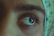 Close-up photo of perfectly laminated, silky smooth eyebrows with a soft natural glow.