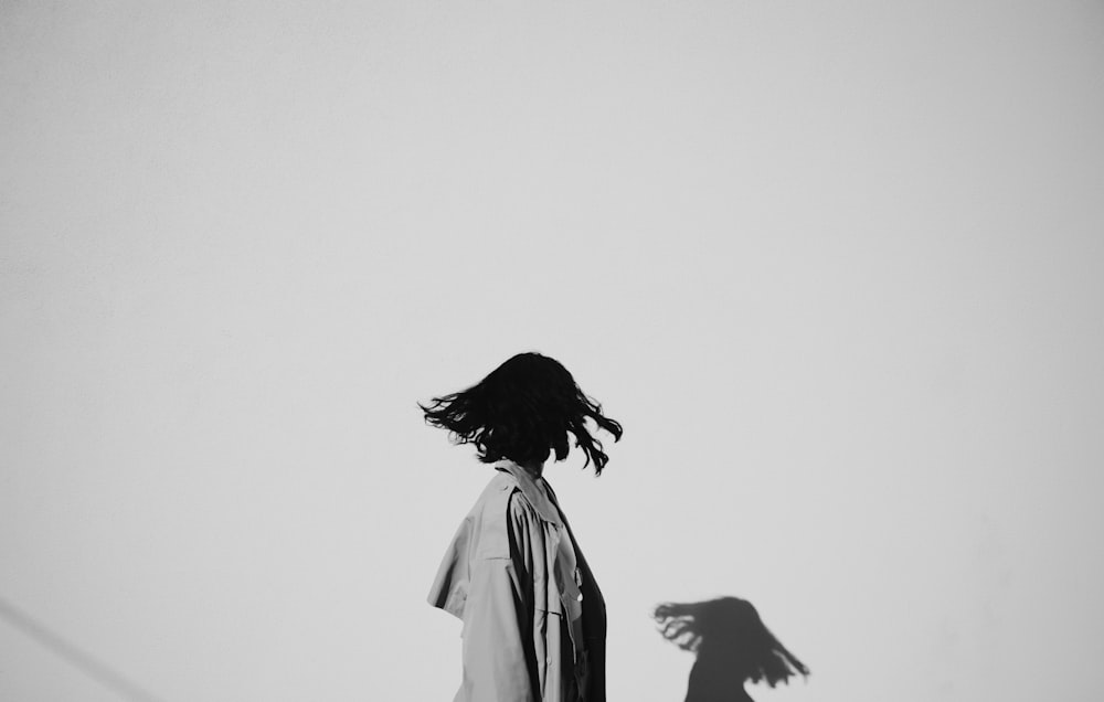 black bird on mans shoulder