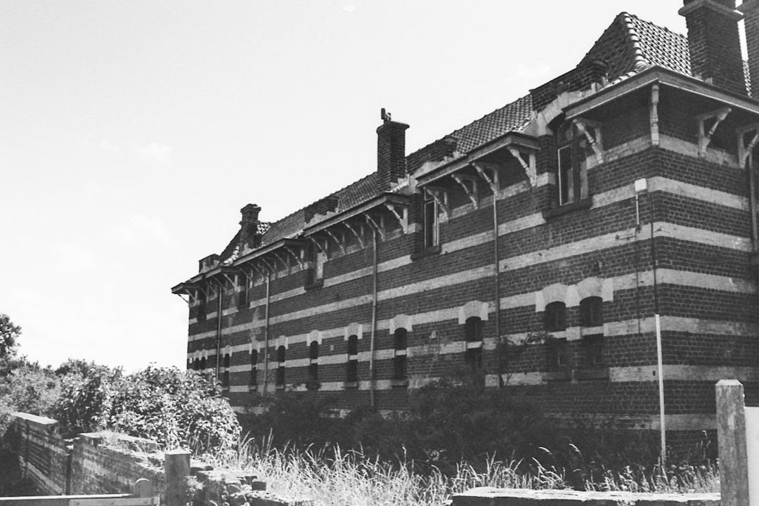 grayscale photo of concrete building