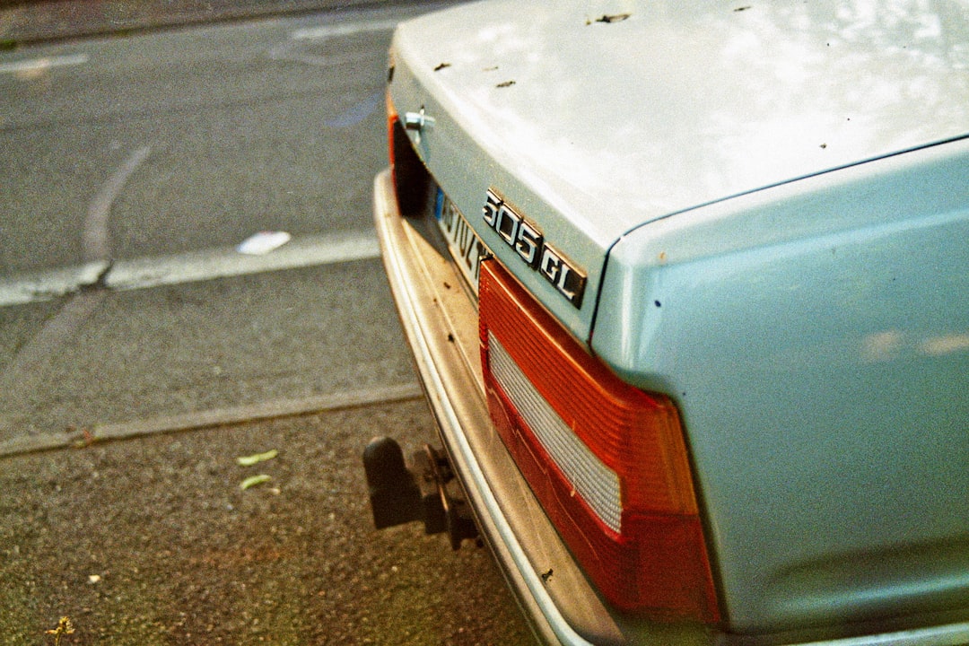 white audi car on road during daytime