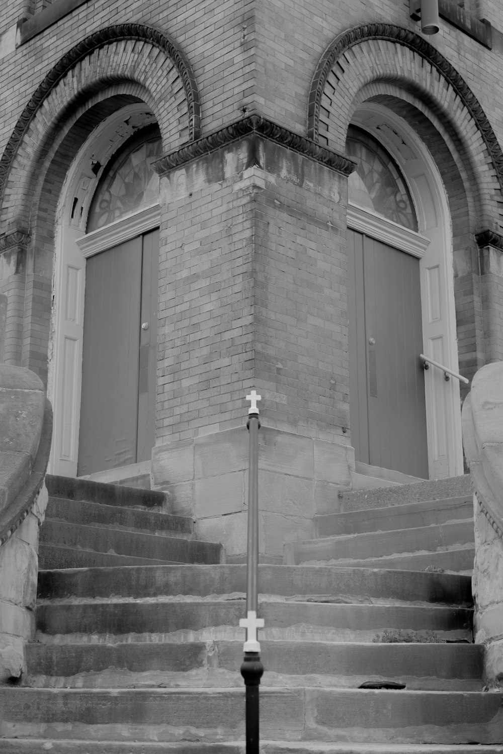 grayscale photo of concrete staircase