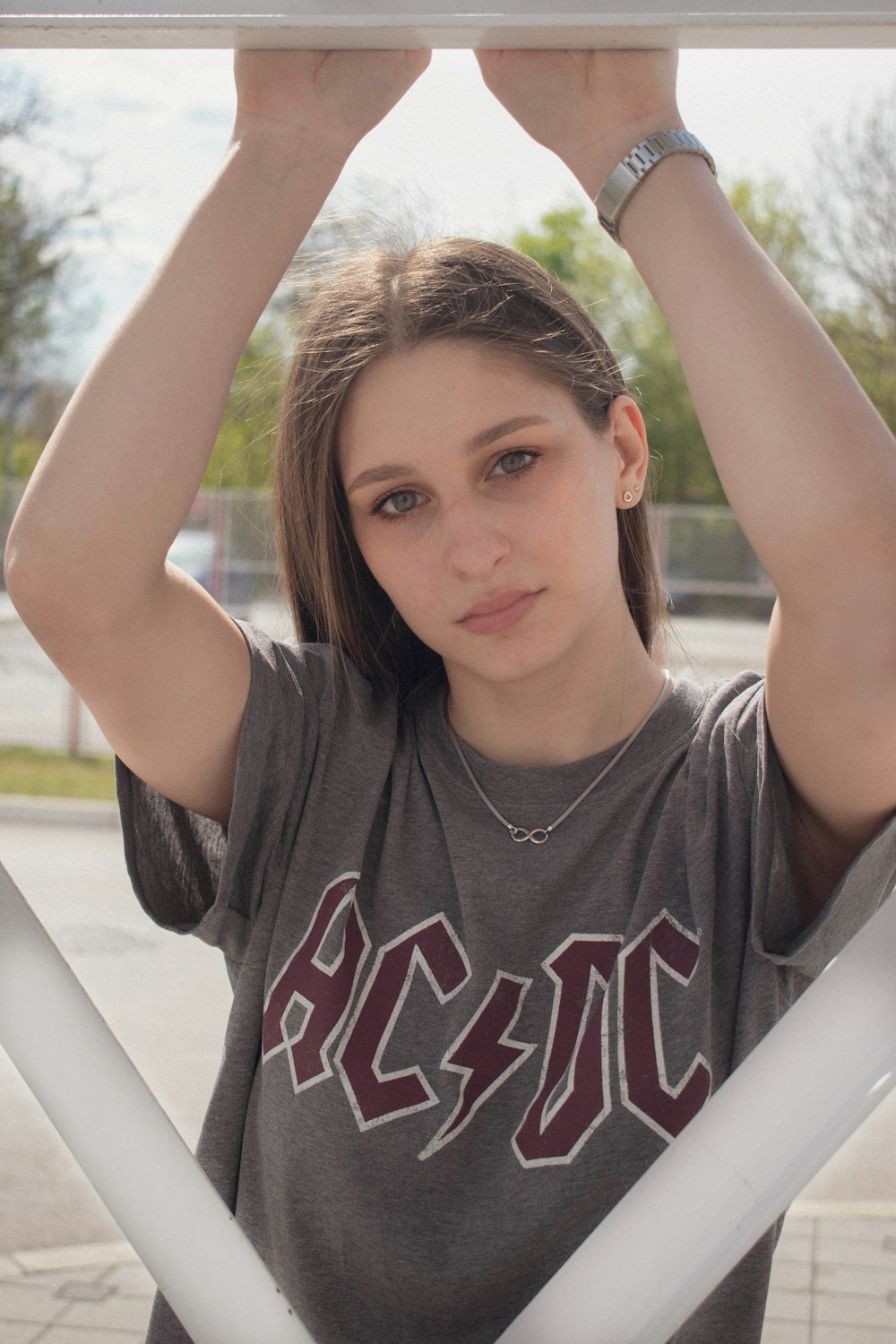 woman in gray and white crew neck t-shirt