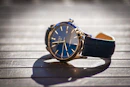 blue and gold analog watch