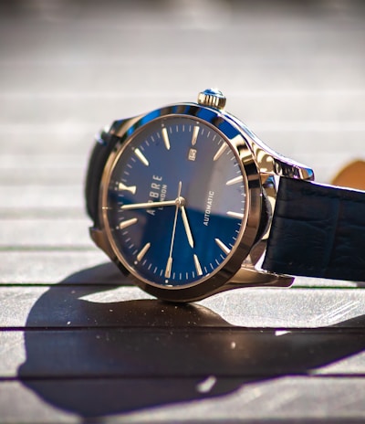 blue and gold analog watch