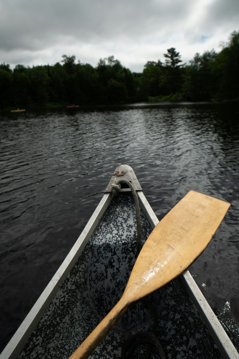 yellow kayak on body of water during daytime