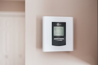 white and gray thermostat at 19 5
