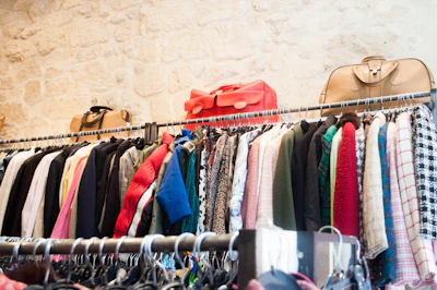 Rack of furniture and clothing marked down for the President's Day sale at Thriftique