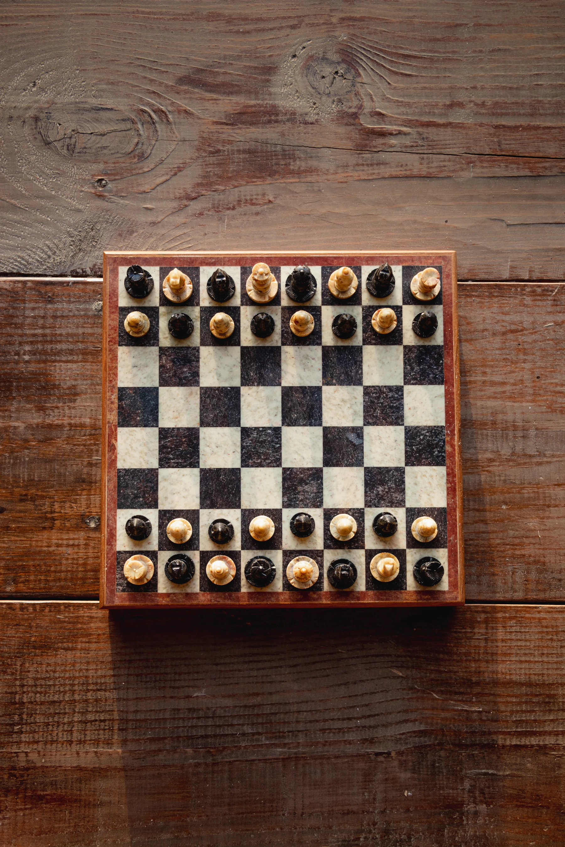 An empty wooden chessboard