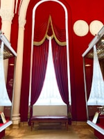 Luxurious interior shot of a private vault with plush navy blue walls and gold trim.