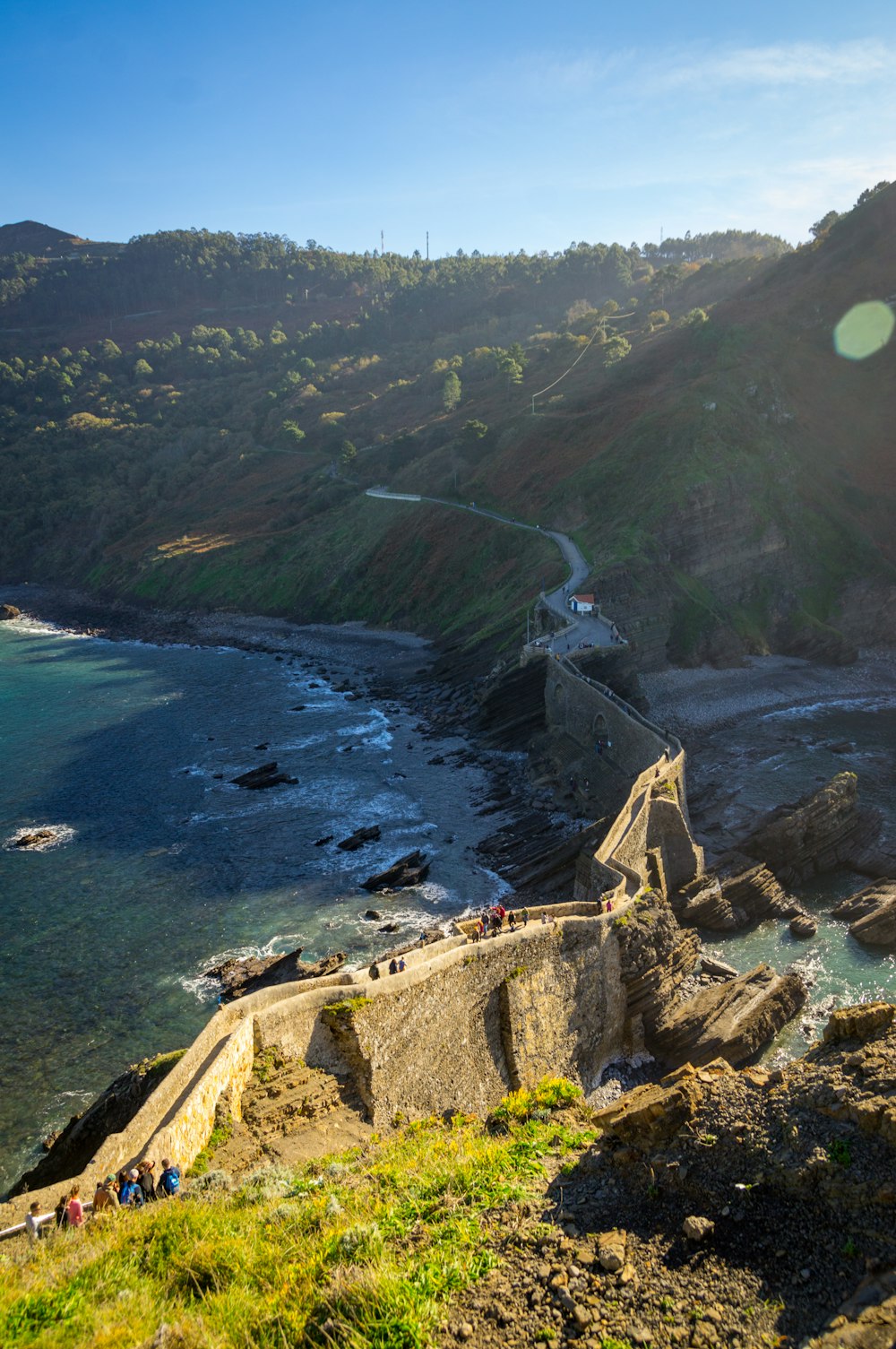 aerial view of a cliff by the sea during daytime