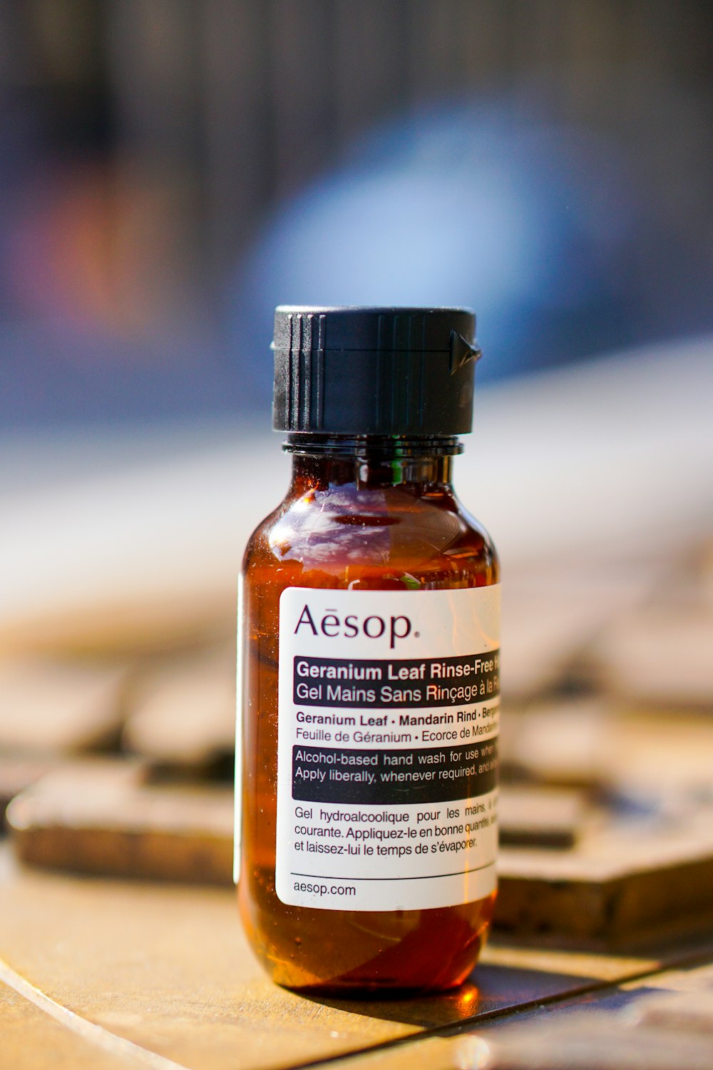 white labeled bottle on brown wooden table