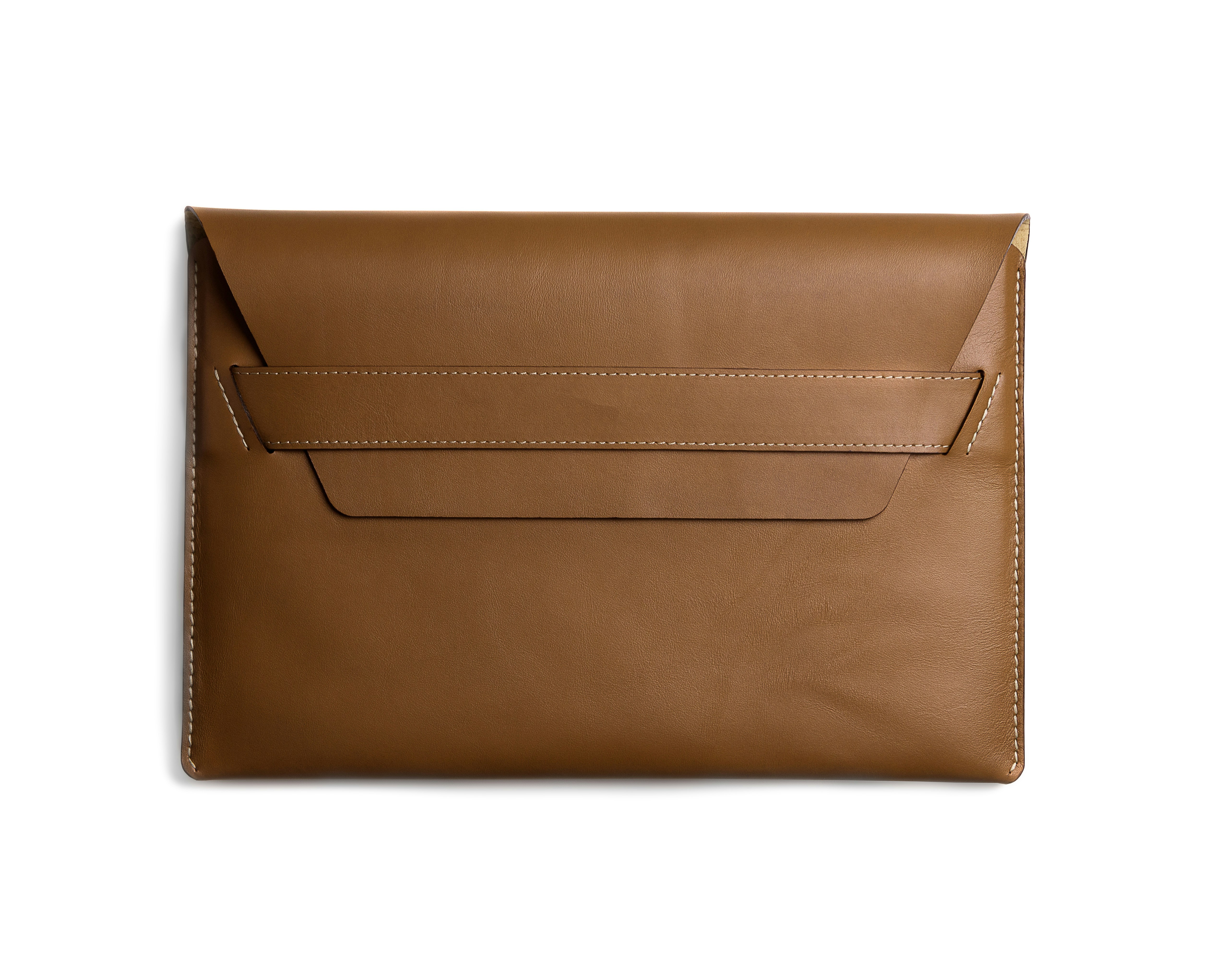 Premium branded laptop sleeve with dark atmospheric product photography and deep shadows