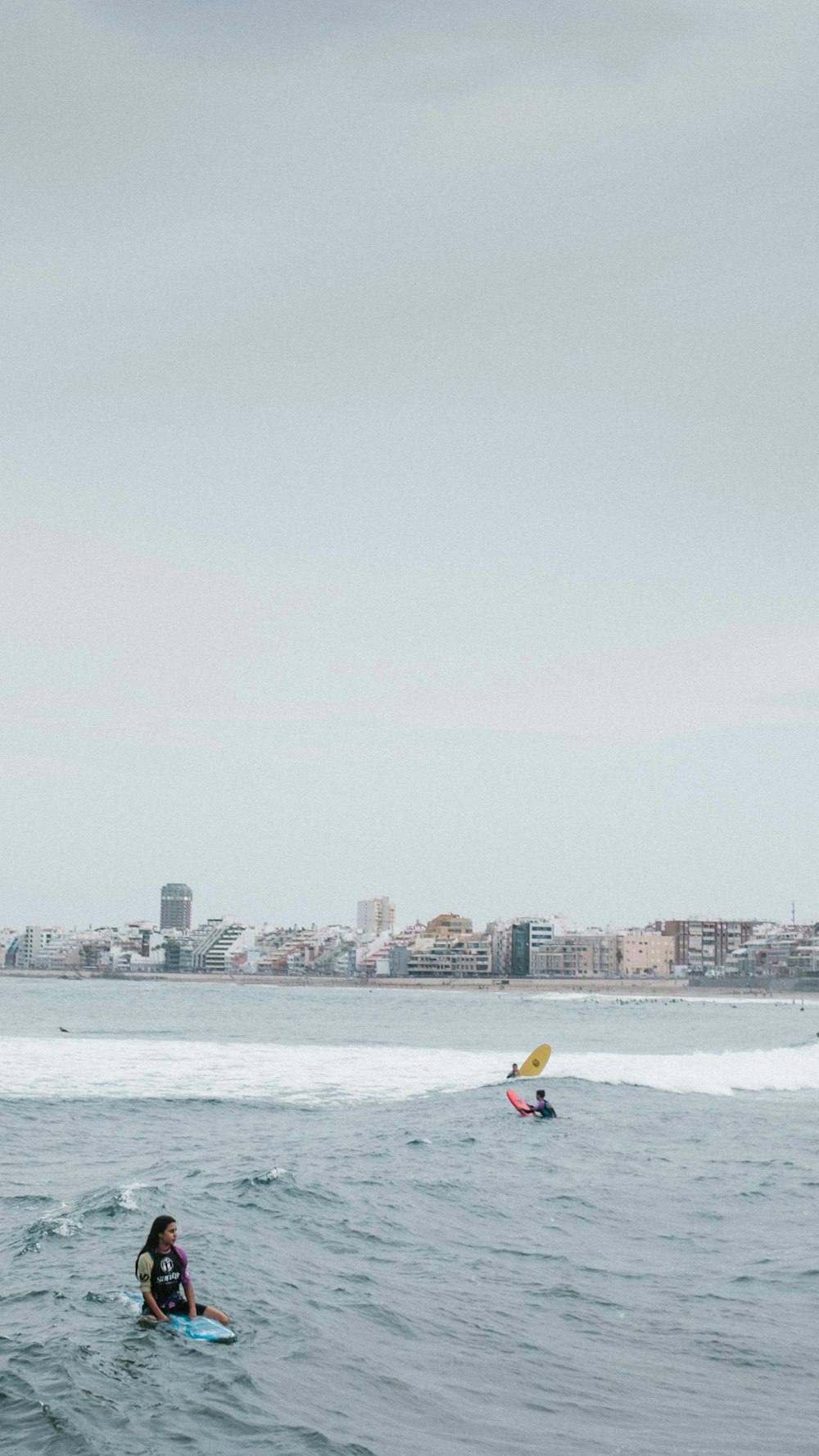 person in yellow kayak on sea during daytime