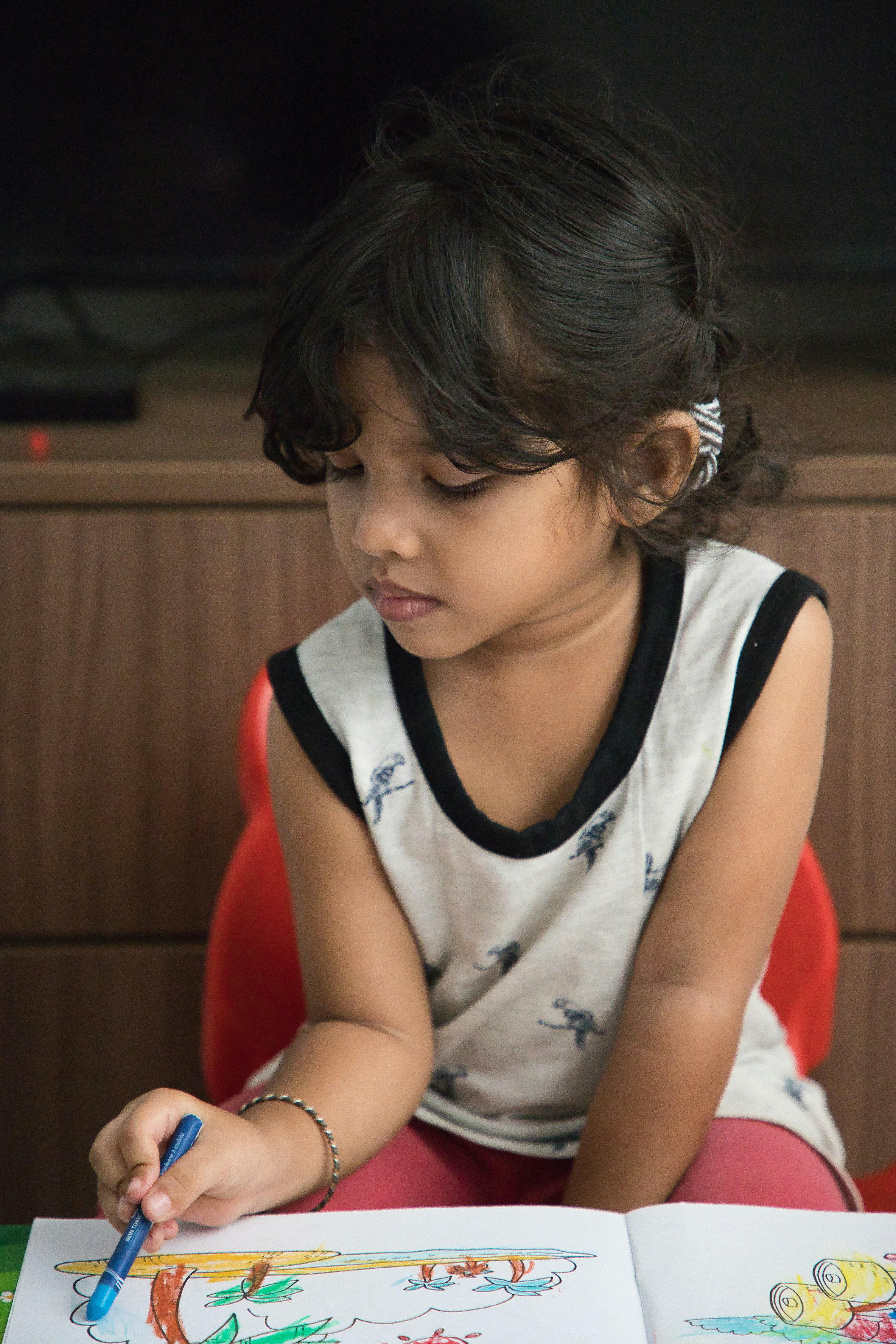 girl in white and black tank top