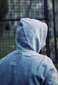 person in blue hoodie jacket