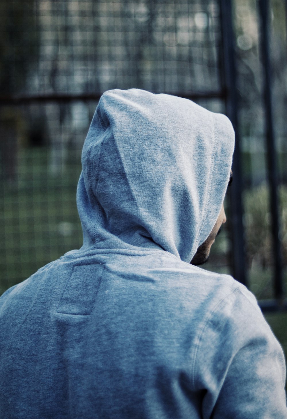 person in blue hoodie jacket