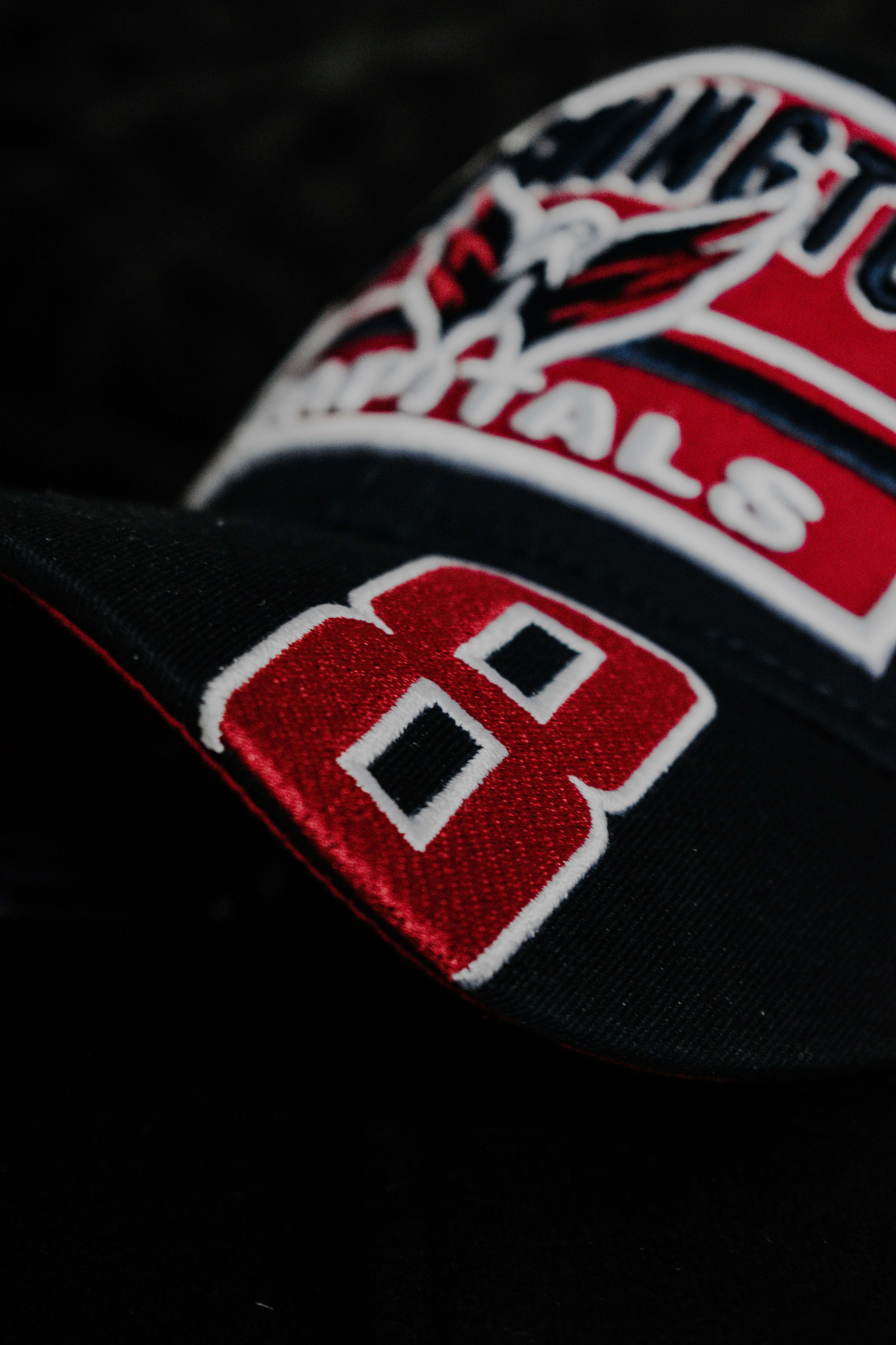 black red and white fitted cap