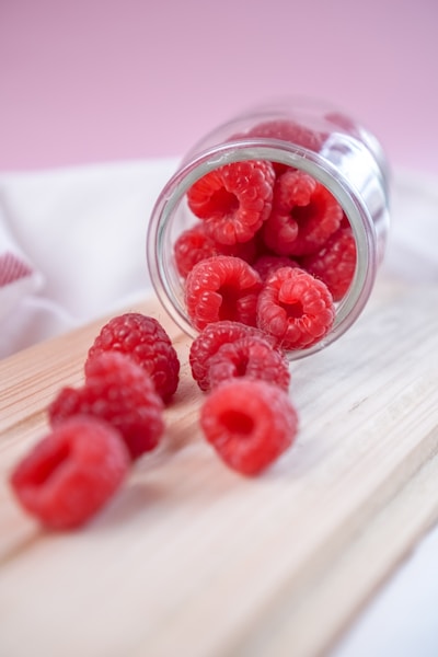 Red raspberry Fruit in clear glass jar