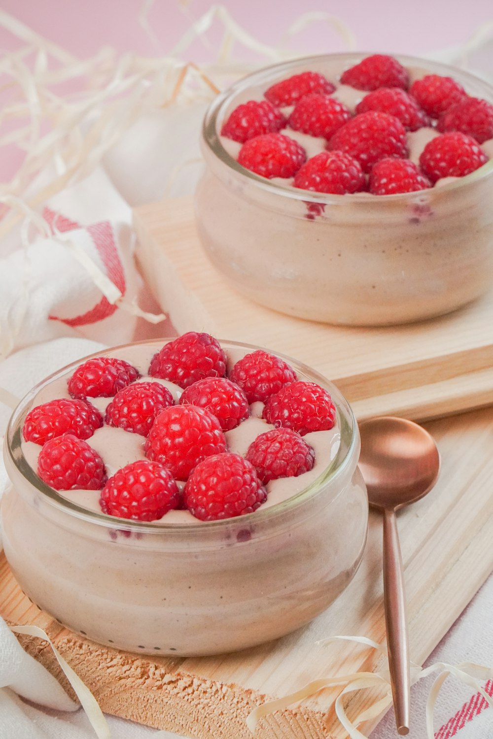 red strawberries in clear glass bowl