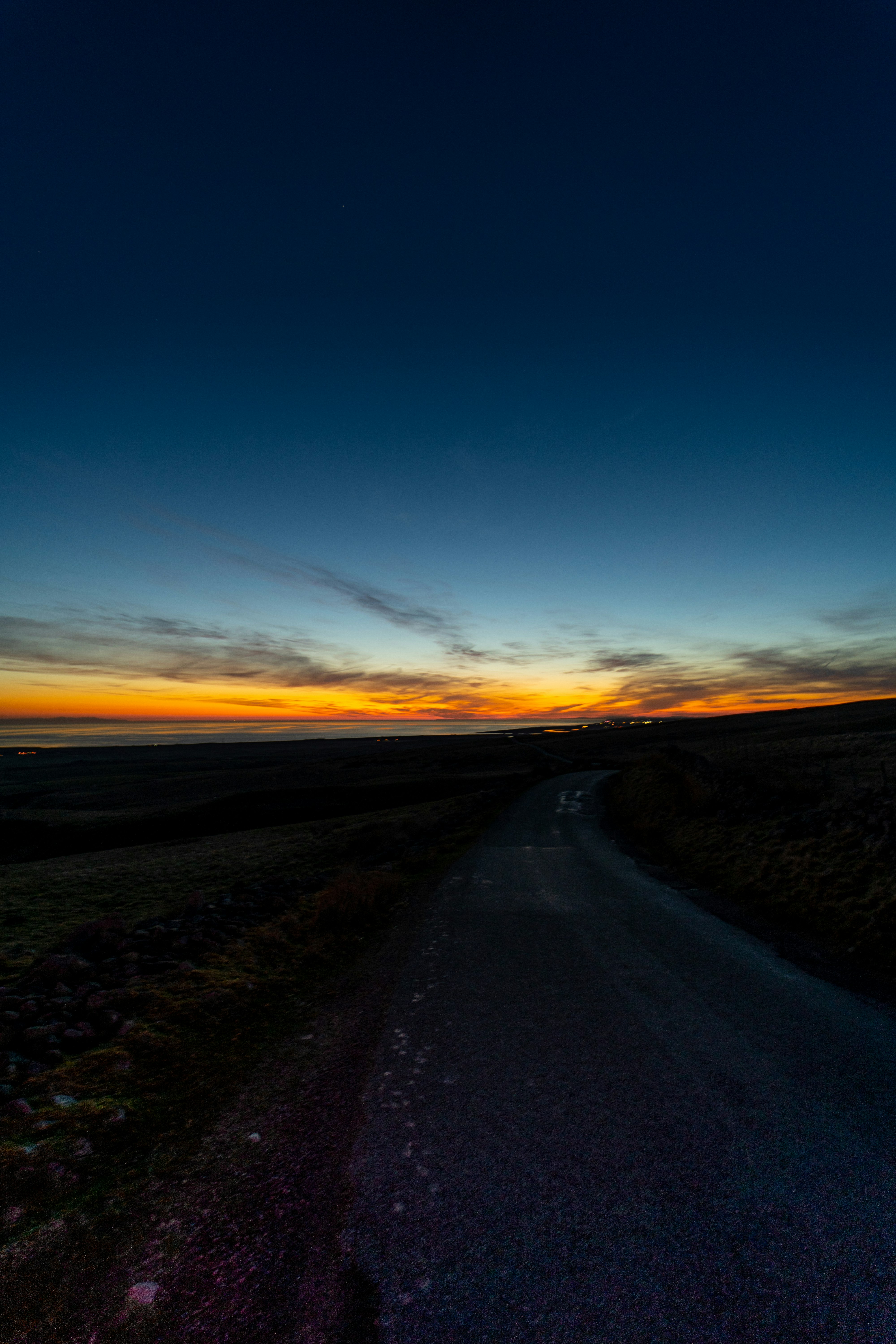 black asphalt road during sunset