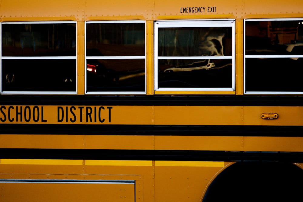 yellow school bus in close up photography