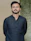 man in black dress shirt