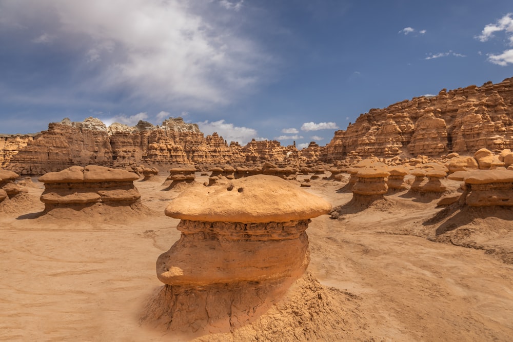 brown rock formation under blue sky during daytime