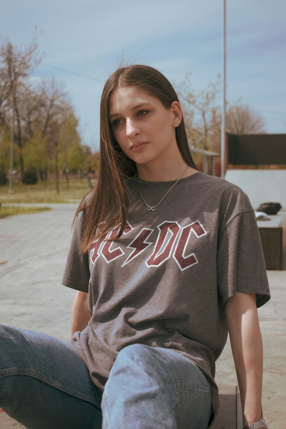 woman in gray and red crew neck t-shirt