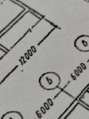Close-up of a detailed product specification sheet with technical drawings and measurements.